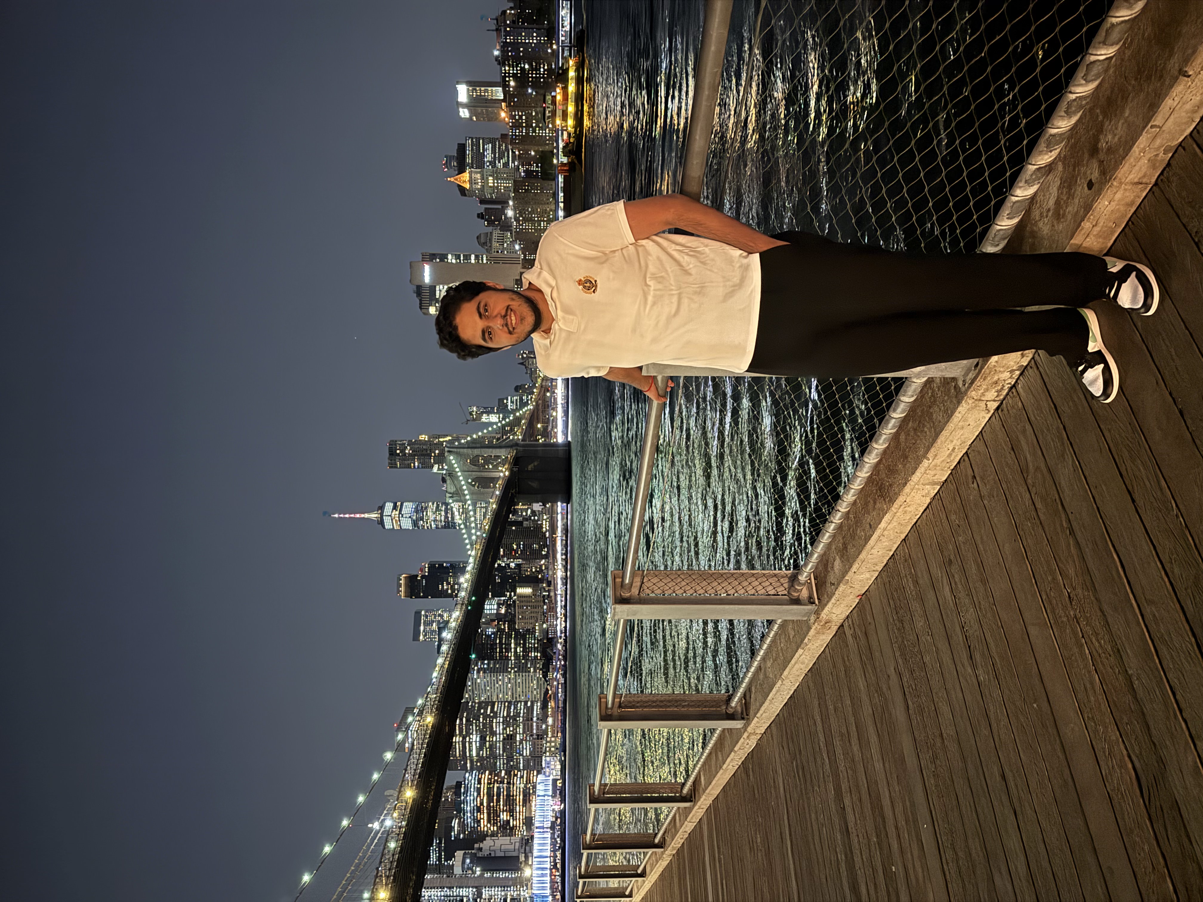 Siddharth Singh by the Brooklyn Bridge at night